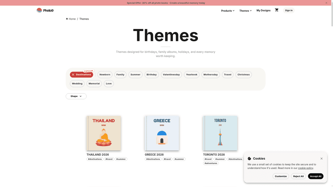 Photo9 destination themes page showing travel photo book cover options